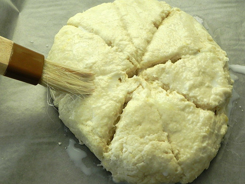 overhead image of egg wash brushed on scones 