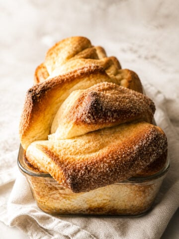 This Cinnamon Sugar Pull-Apart Bread is made completely from scratch and totally irresistible! Soft and fluffy bread and a gooey cinnamon sugar filling make for the perfect weekend baking project.