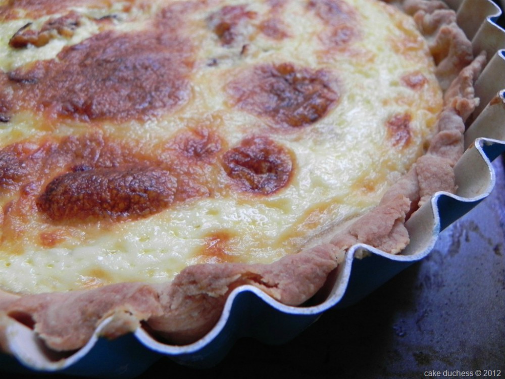 overhead image of quiche in a pan