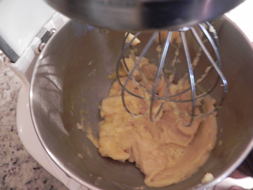 overhead image of dough in a mixer