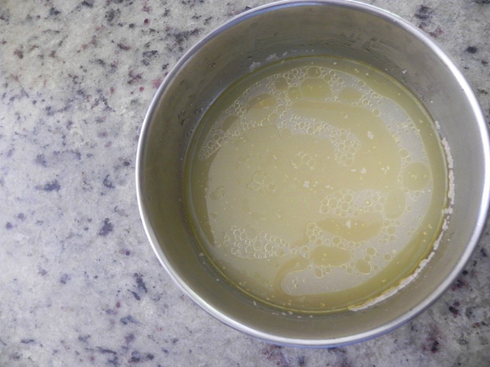 overhead image of yeast proofing in a small bowl