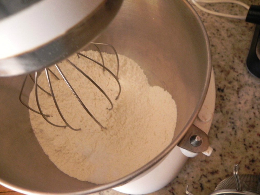 overhead image of flour in a mixer