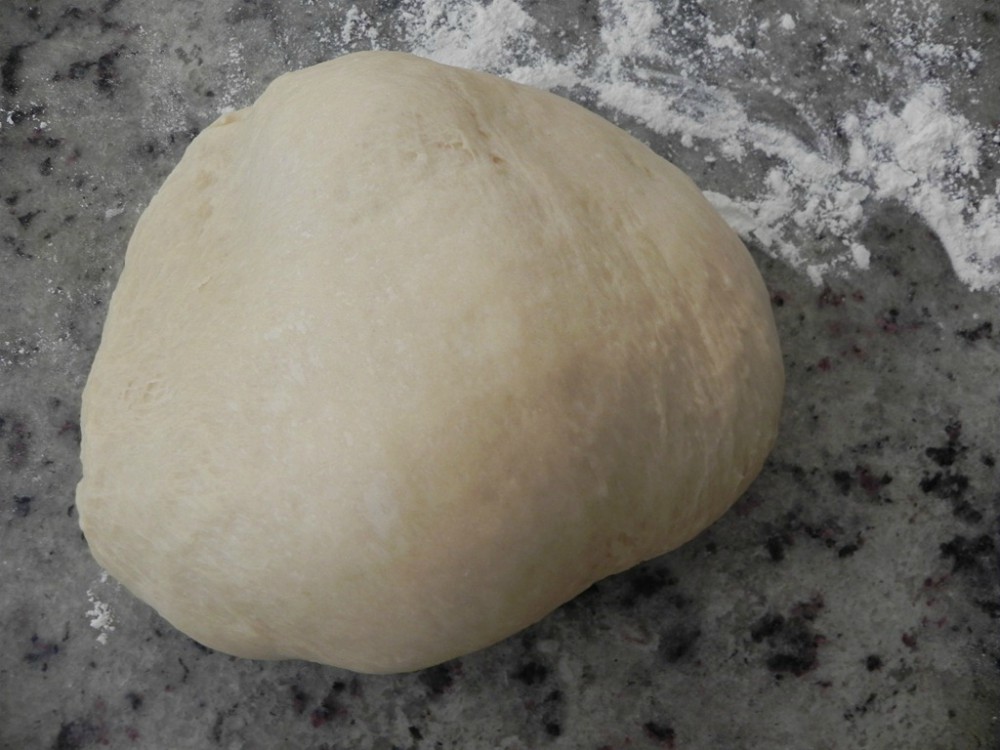 overhead image of dough on a counter