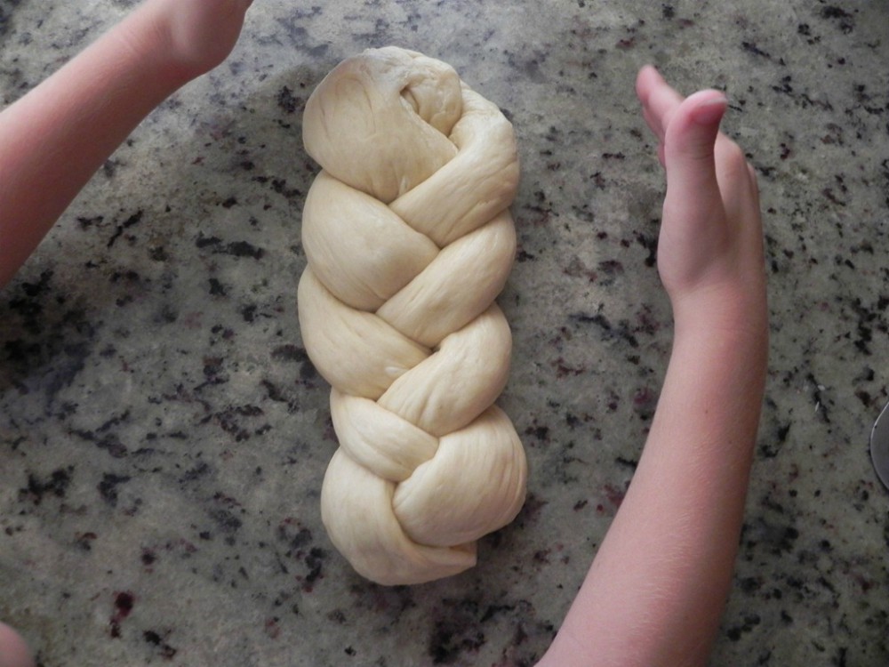 overhead image of a braided loaf of bread