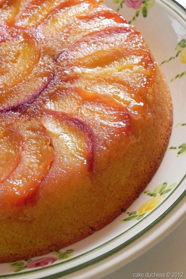 overhead image of peach and cornmeal upside-down cake
