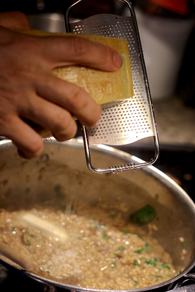 image of grating cheese in a risotto