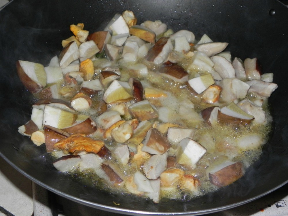 overhead image of mushrooms cooking