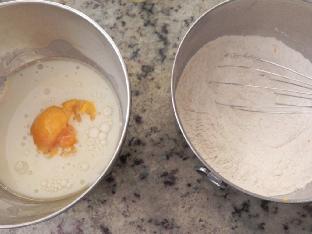 overhead image of eggs in batter and flour