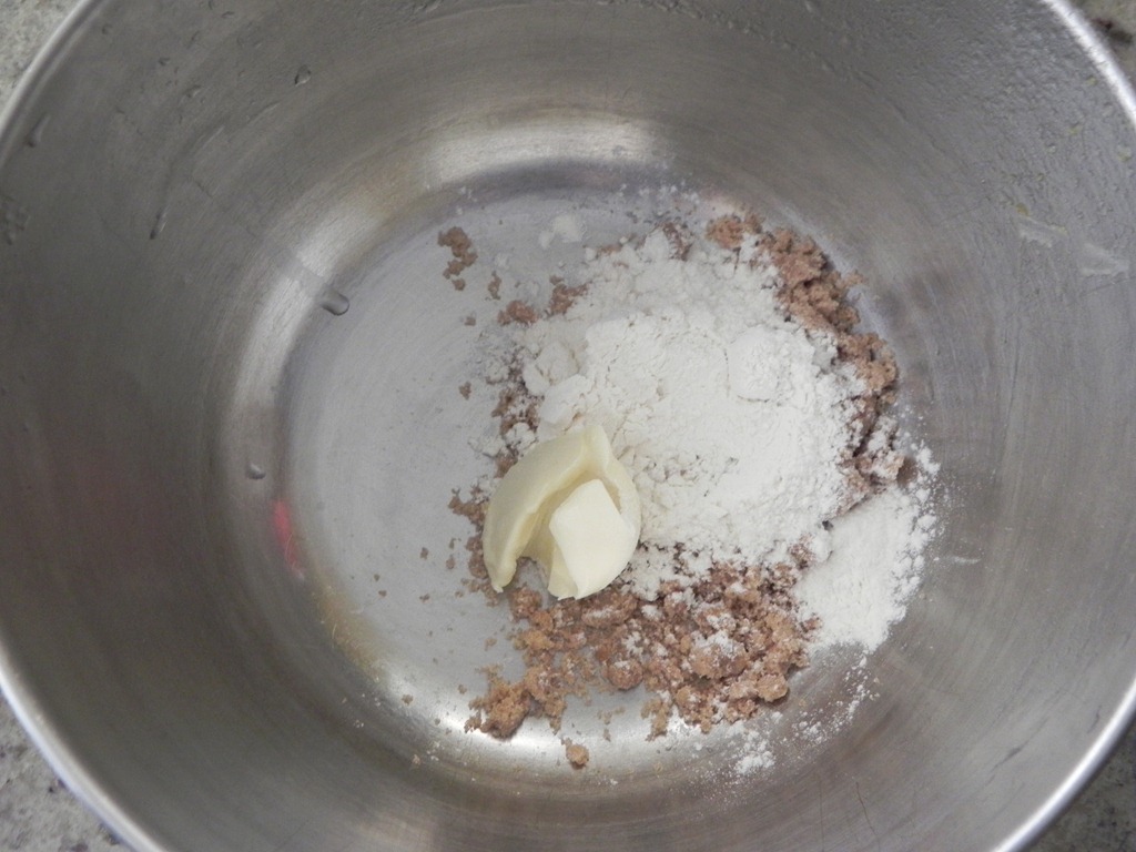 overhead image of butter and flour in mixing bowl