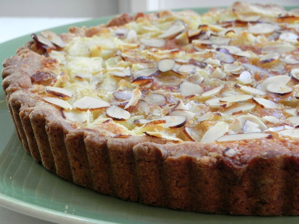 overhead image of apple and almond custard tart