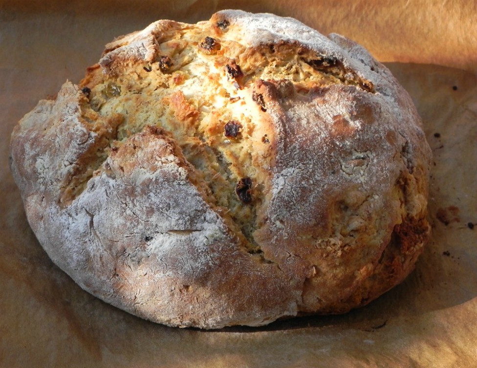 overhead image of irish soda bread on parchment paper