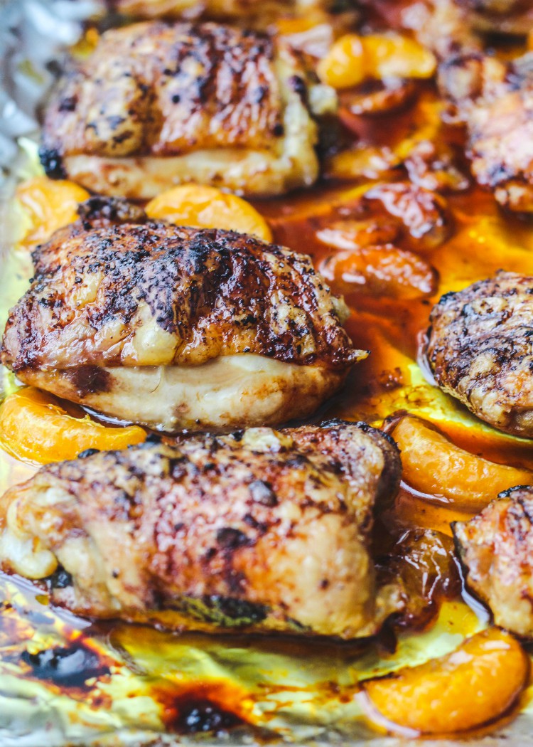 overhead image of baked chicken on a baking sheet