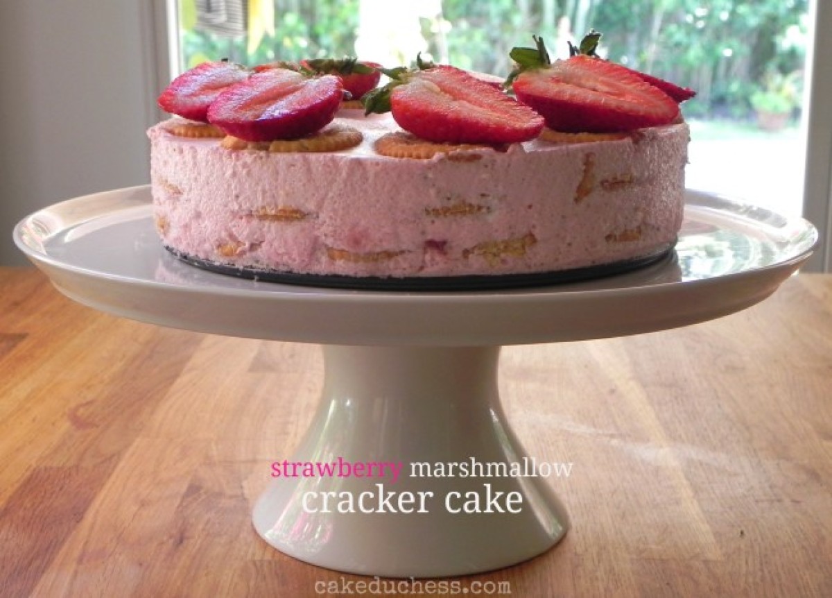 image of a Strawberry Marshmallow and Cracker Cake on a cake stand