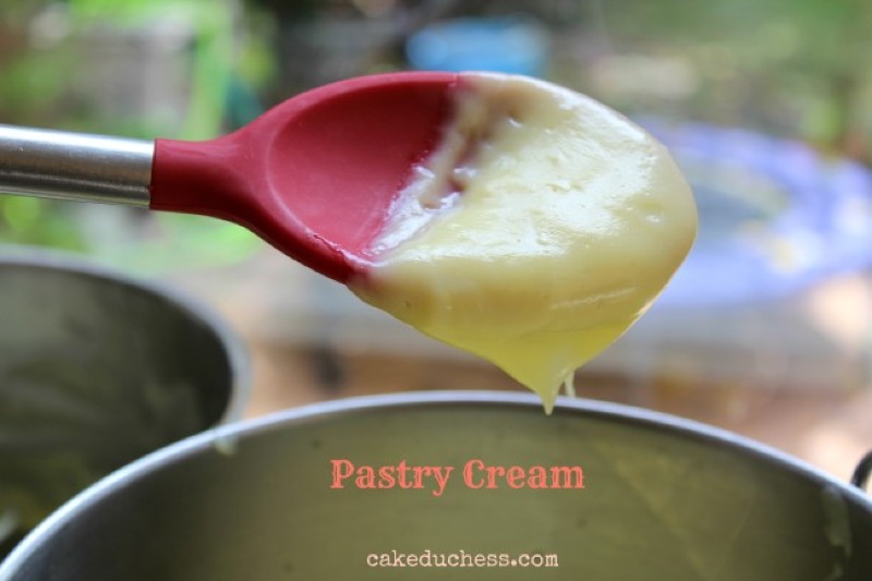 overhead image of pastry cream on a spoon