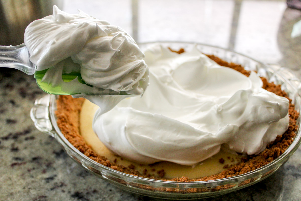 image of spreading topping on a pie