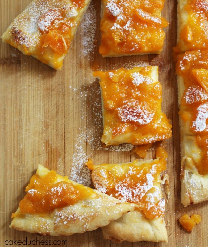 overhead image of summer apricot bread sliced on cutting board