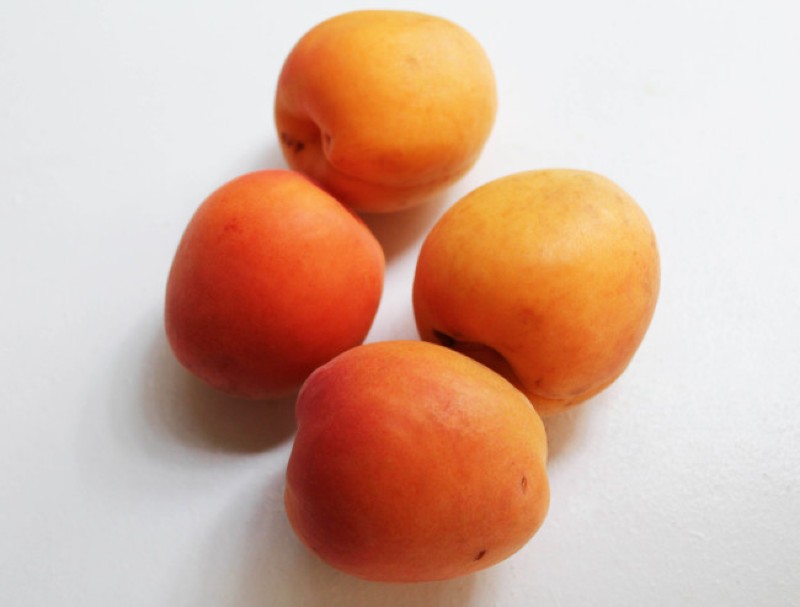 image of orange fruit on a white background