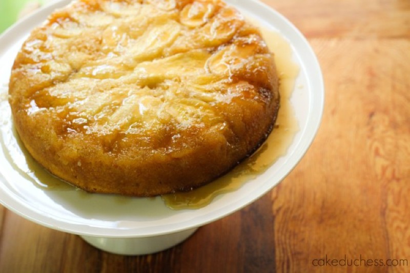 overhead image of banana coconut cake on a white plate