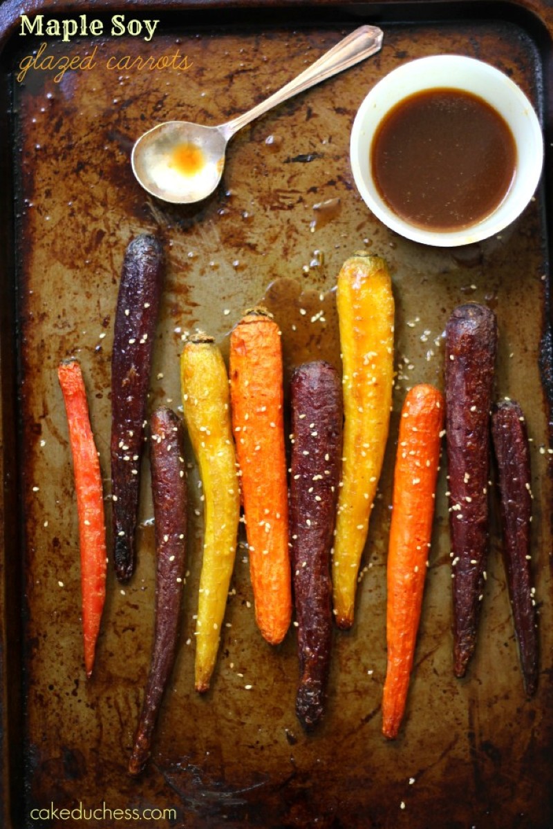 overhead image of maple soy glazed spring carrots on a baking sheet