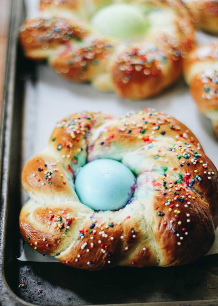 braided easter bread loaves on baking sheet