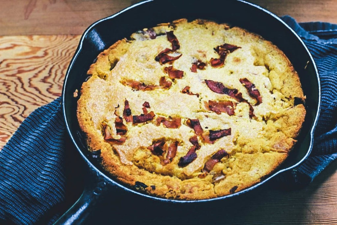 overhead shot of pancetta cornbread in a pan