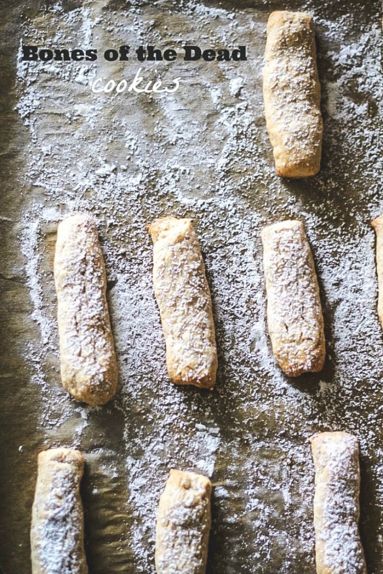 Overhead image of 7 Bones of the Dead Cookies-Ossa di Morto Italian cookies on parchment paper.