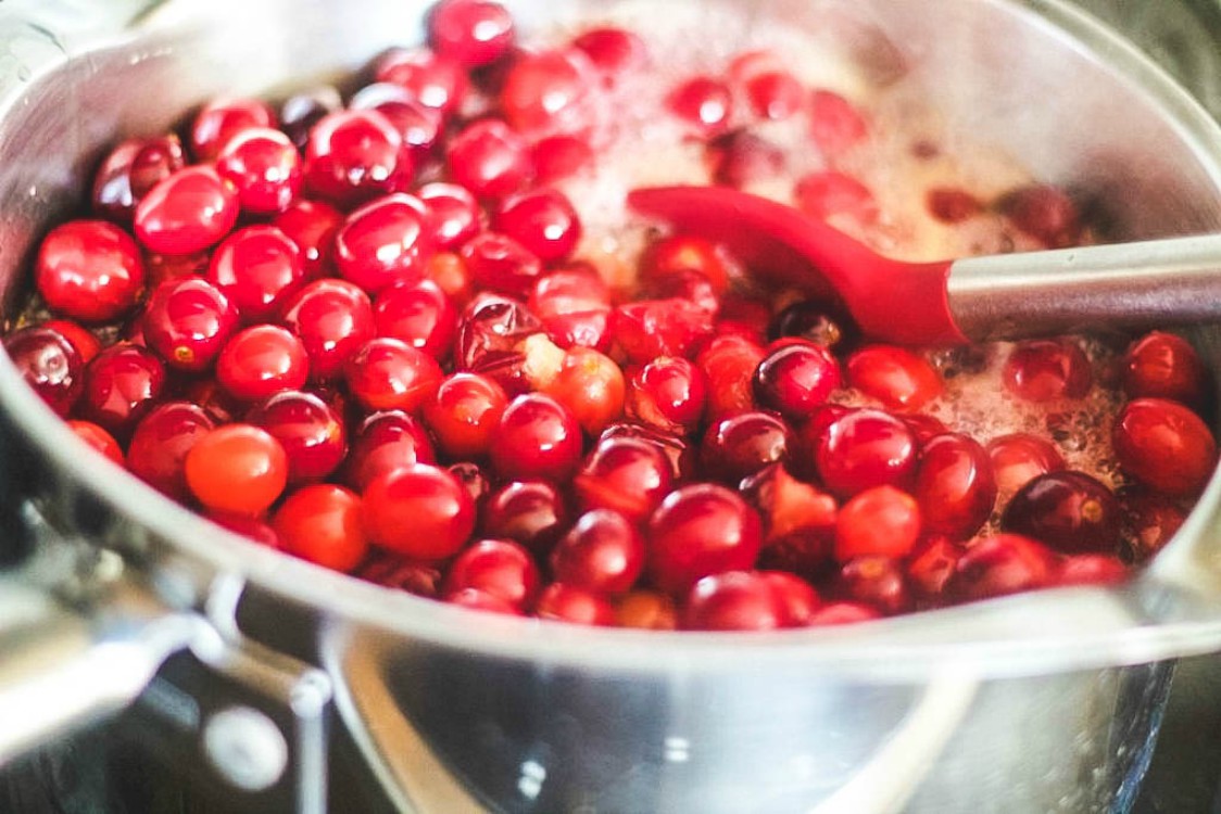 cranberries cooking in a large sauce pan