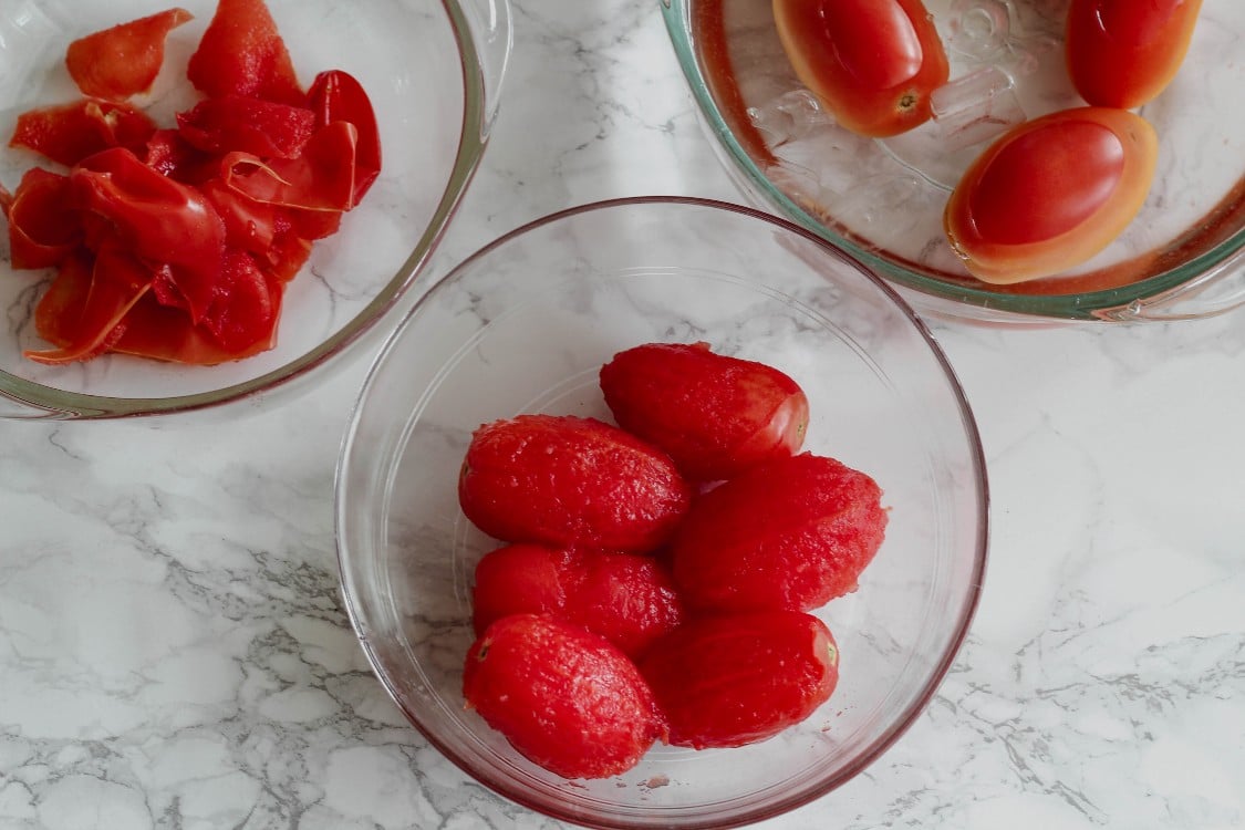 image of tomatoes in glass bowls