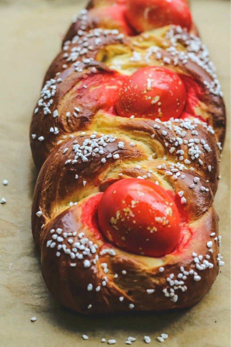 overhead image of easter egg bread with white sprinkles