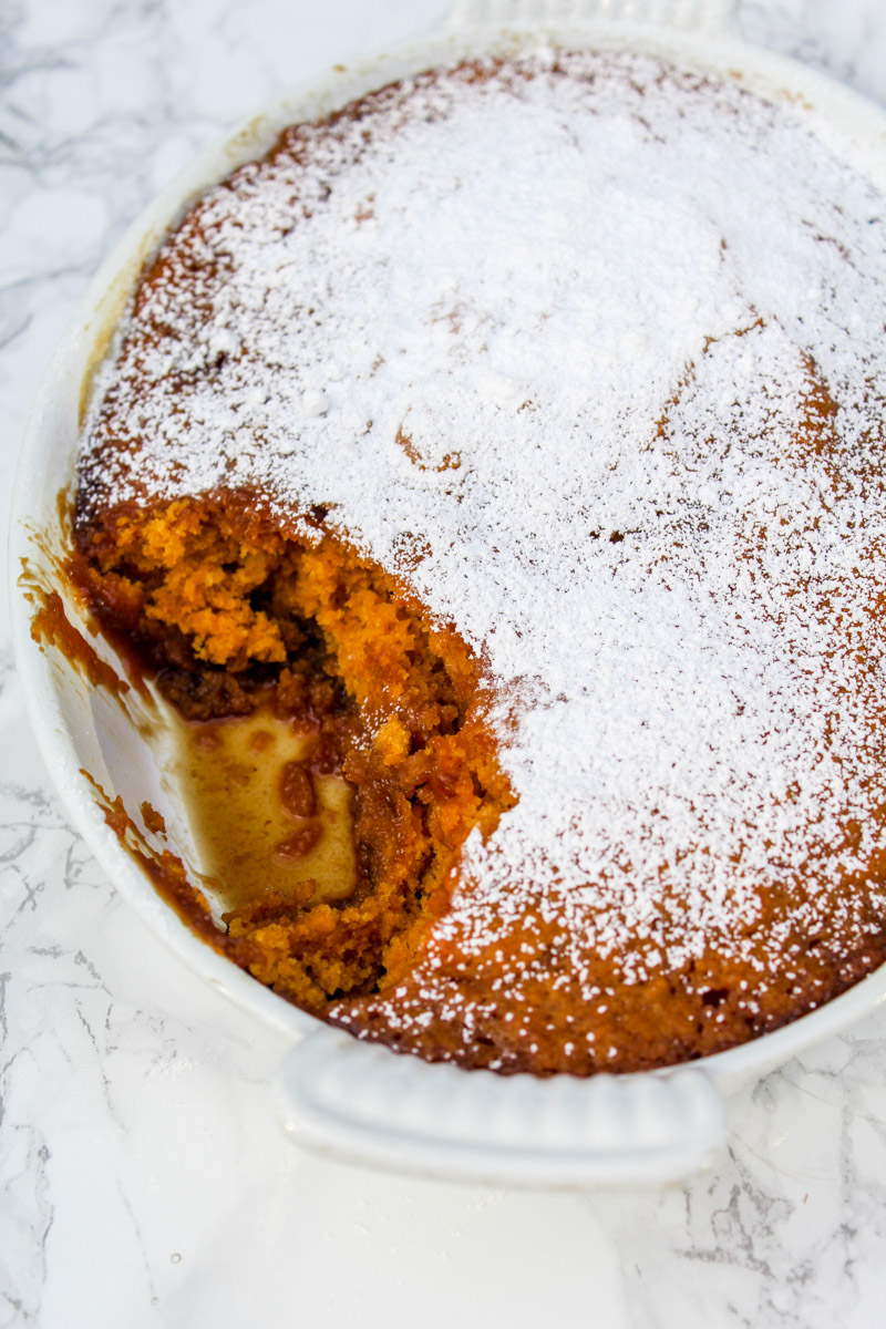 overhead image of easy pumpkin pudding cake in pan