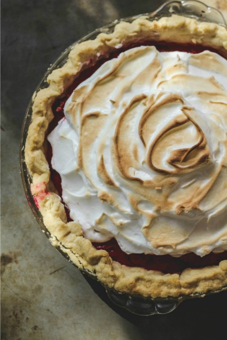 overhead shot of cranberry meringue pie on baking tray