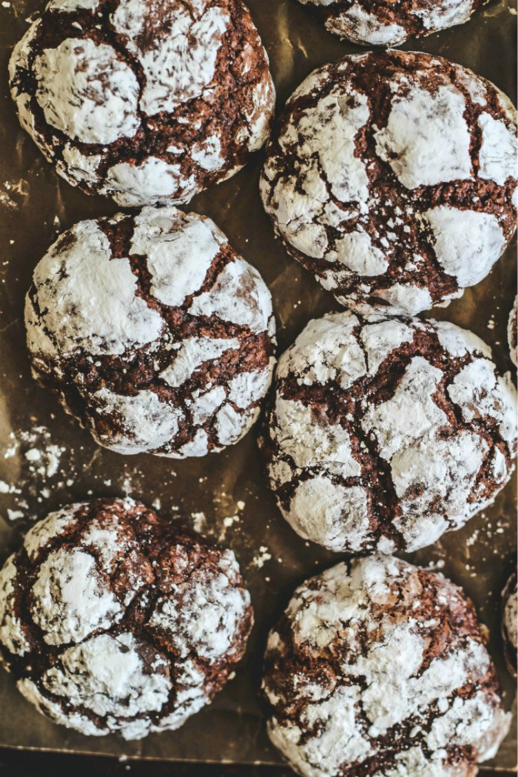 overhead image of chocolate cookies on a baking sheet.