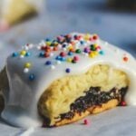 Cuccidati, also known as Italian Fig Cookies on parchment paper.