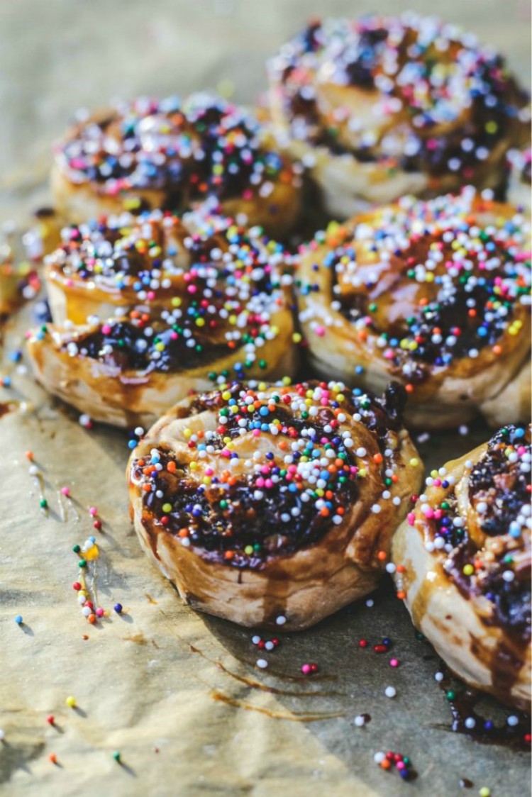 overhead image of fig pastries with sprinkles on top