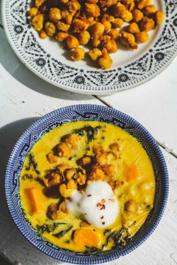 overhead image of chickpea stew with kale and sweet potatoes