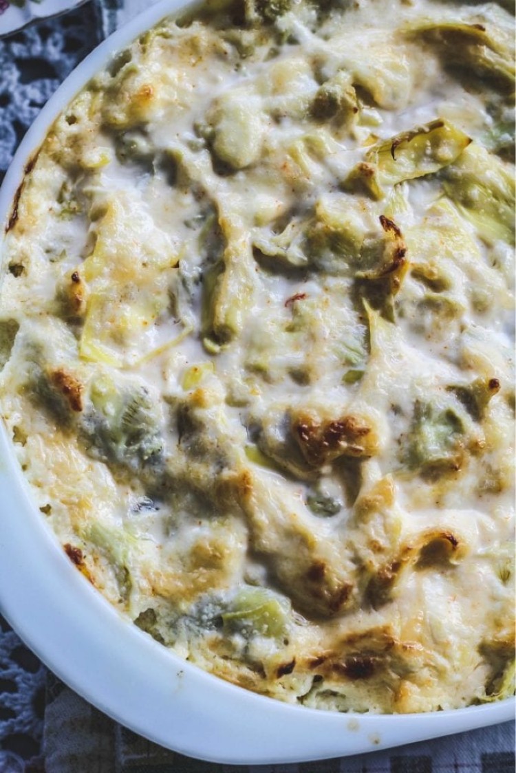 overhead image of hot and cheesy artichoke dip