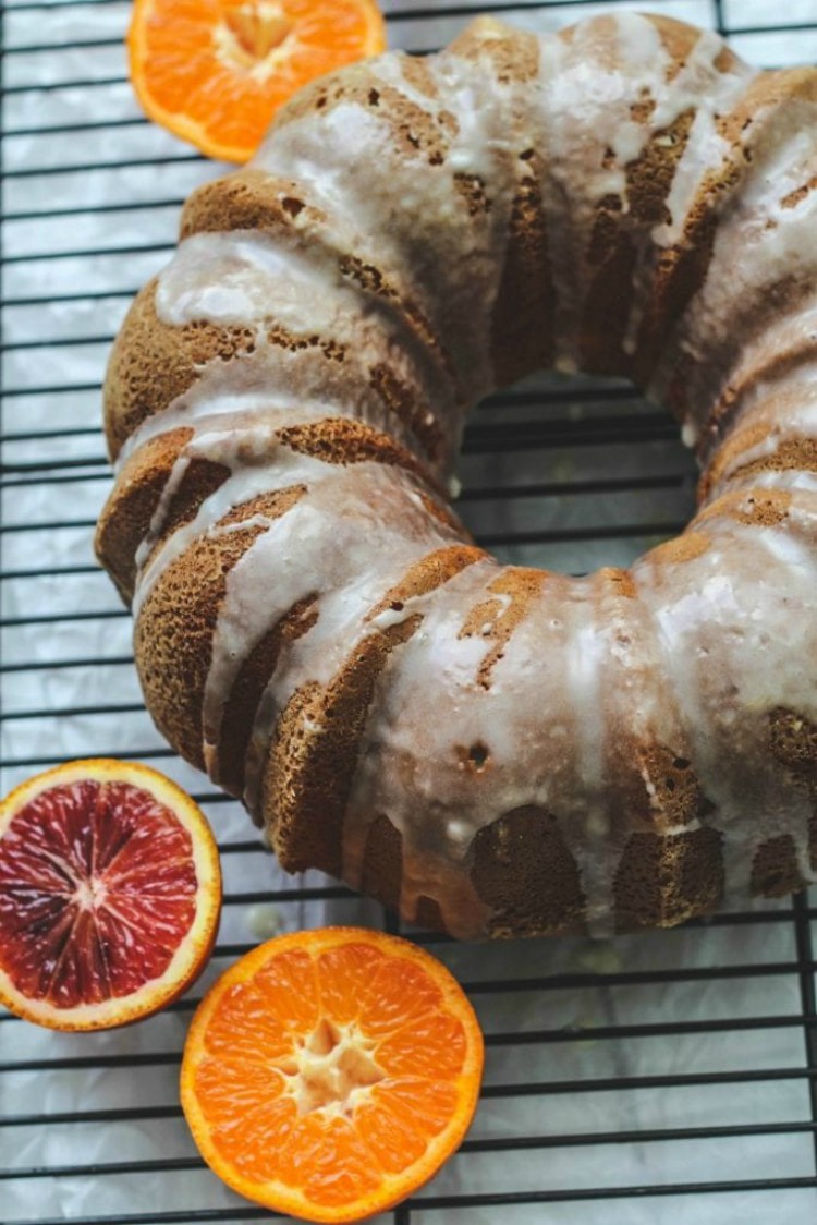 overhead image of bundt cake with oranges 