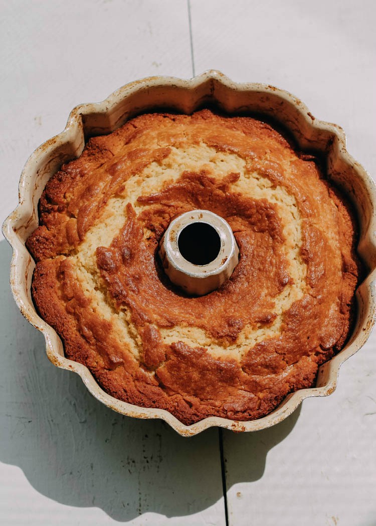 bundt cake with lemon curd filling in pan