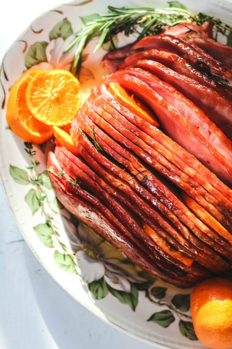 overhead image of rosemary brown sugar glazed spiral ham.