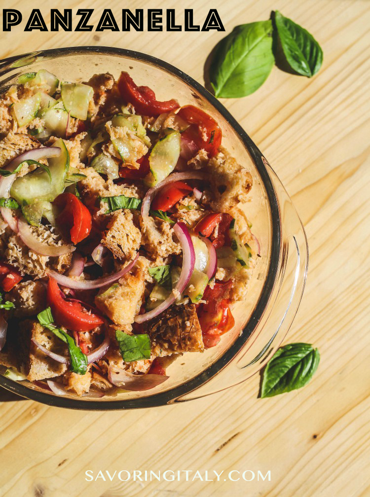 overhead image of bread salad in glass bowl