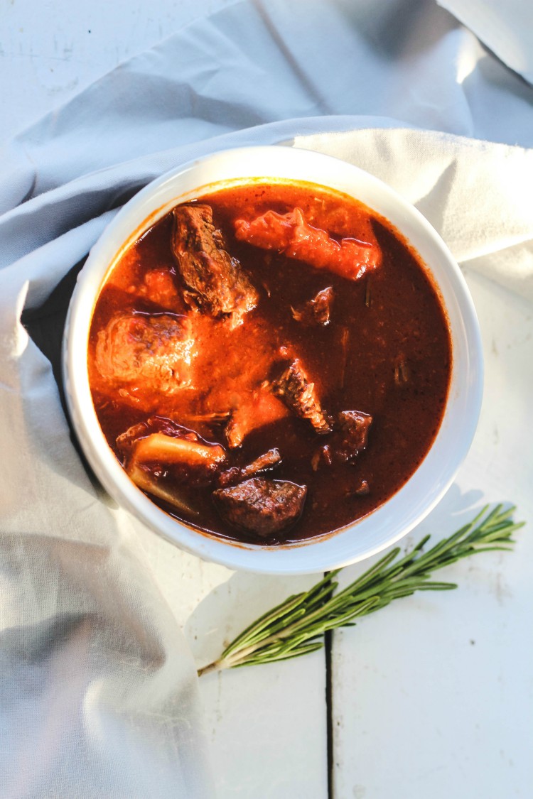 overhead image of Italian beef stew in white bowl