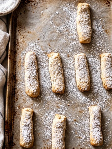 Close-up of bones of the dead cookies dusted with confectioner's sugar