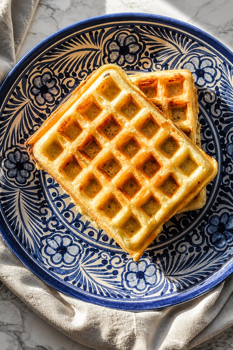 Marion Cunningham waffles on a blue plate.