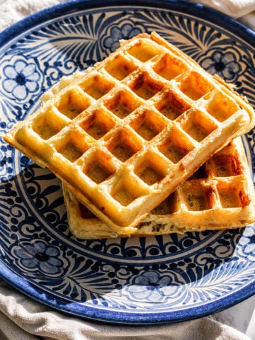 Marion Cunningham waffles on a blue plate.