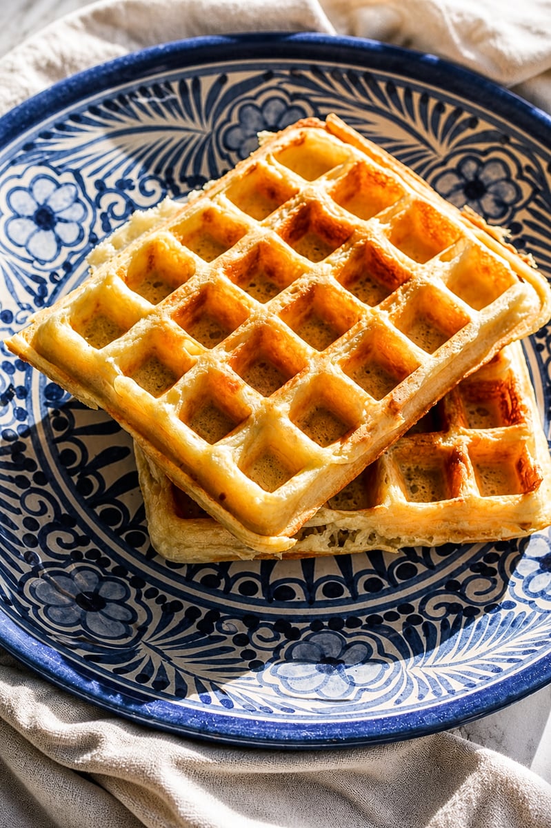 Marion Cunningham waffles on a blue plate.