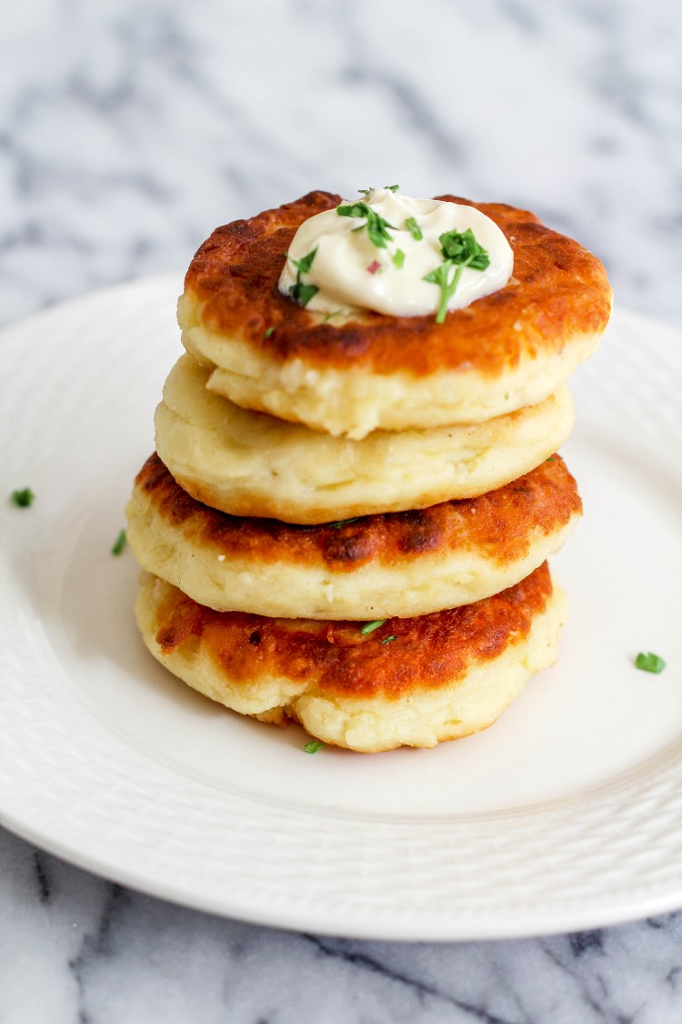 overhead image of cheesy leftover potato pancakes