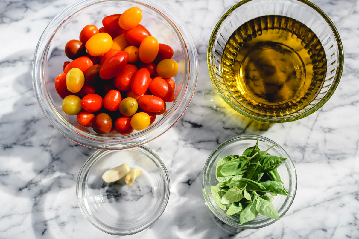 overhead image of making cherry tomato confit 