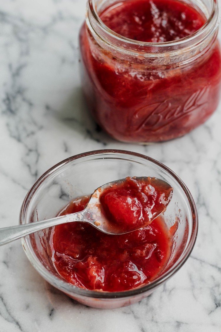 image of plum jam in a glass dish