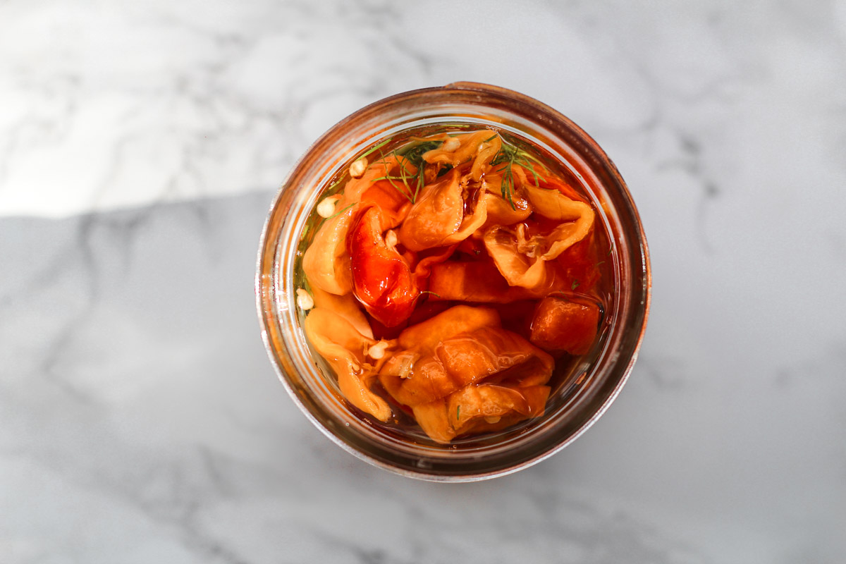 image of peppers in a glass jar