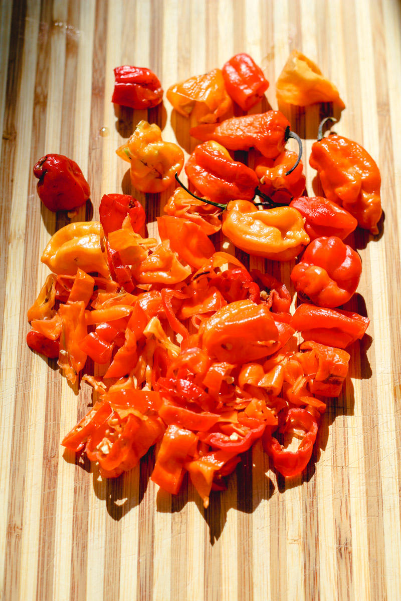 overhead image of peppers on a cutting board